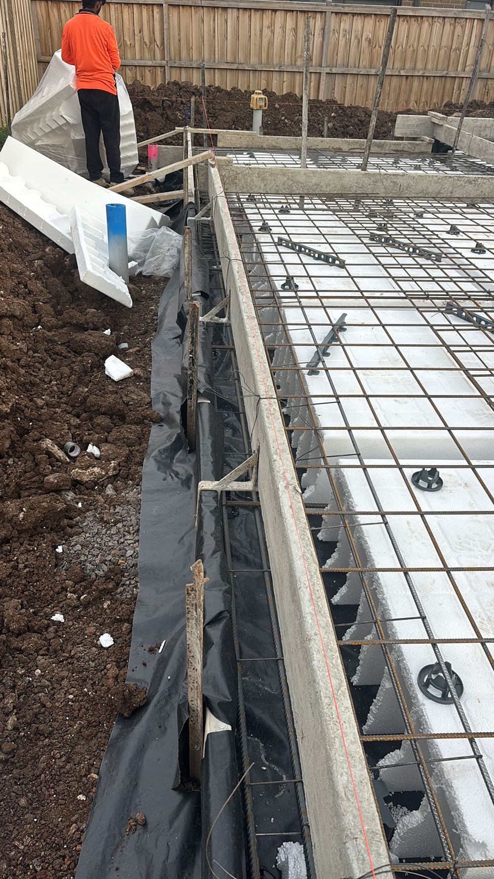 Star picket and reo bar caps not installed, recorded on a pre-pour inspection in Fraser Rise