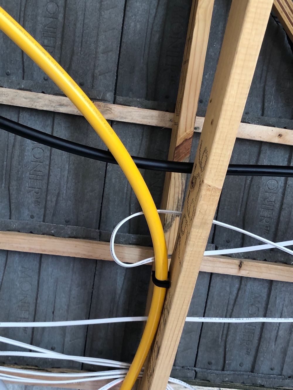 Cable in contact with a gas pipe, recorded on a lock-up inspection in Fraser Rise