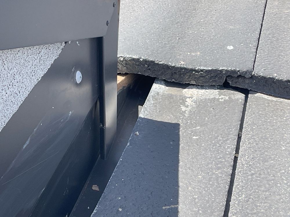Cracked tile on a two storey roof, Fraser Rise