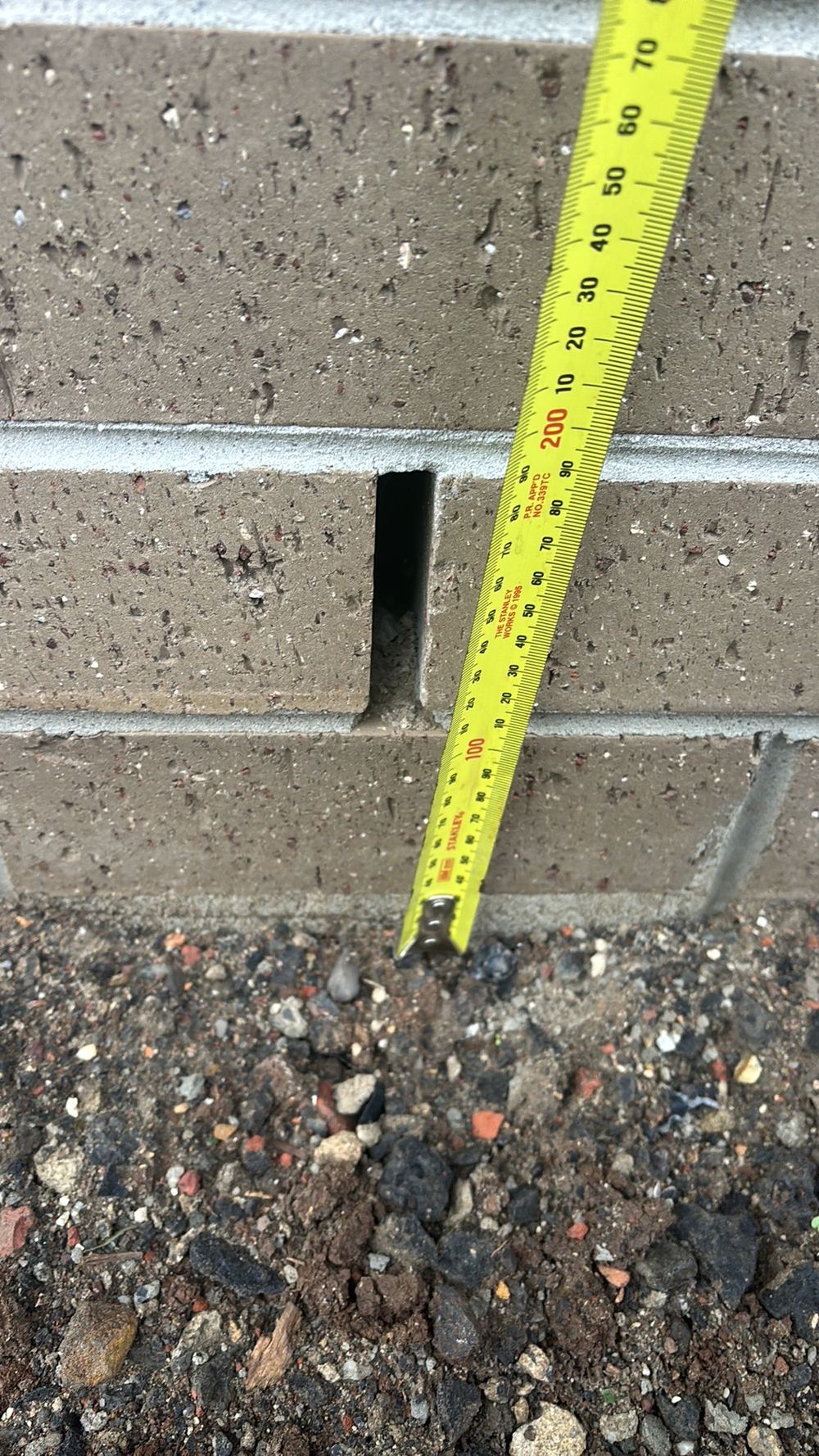 Weep hole clearance below 150 mm, recorded on a pre-handover inspection in Fraser Rise