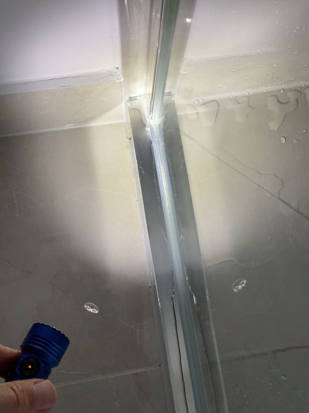 Finding a leaking shower before the ceiling below does