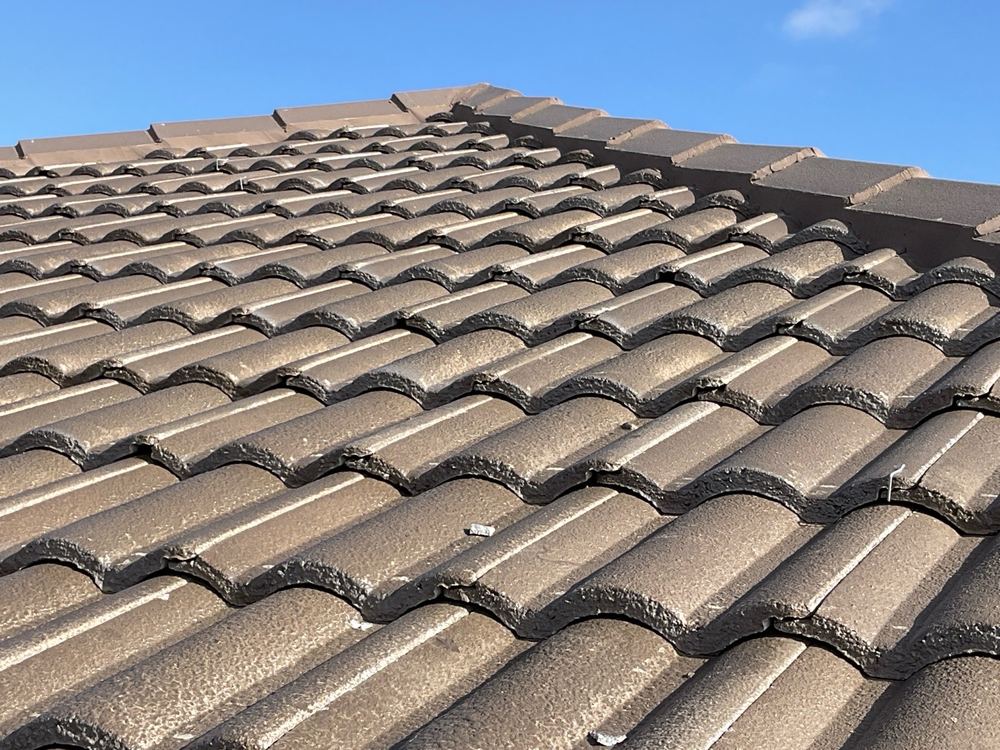Broken roof tile underlap, recorded on a pre-handover inspection in Fraser Rise